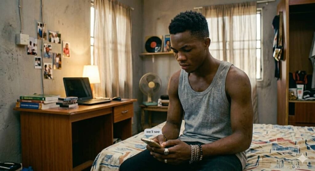 A young Nigerian man sits on his bed in a modestly furnished room, looking thoughtfully at his smartphone. A small digital chat bubble above the phone displays the message "we'll see," capturing a moment of social uncertainty.